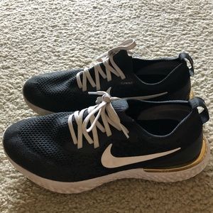 Nike Epic React Flyknit tennis shoes